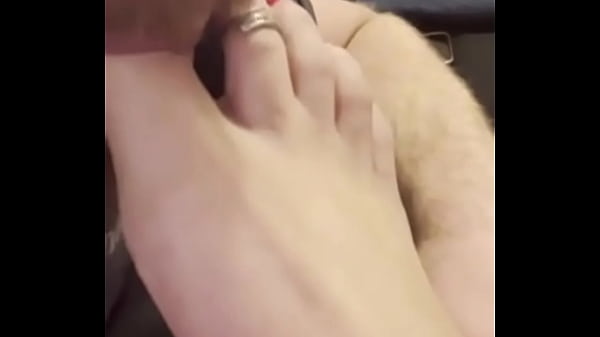 Sucking her sexy toes before ballbusting