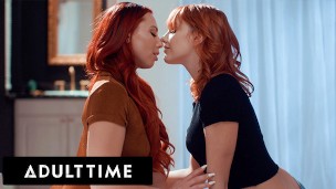 Sensual lesbian sex between two redheaded women